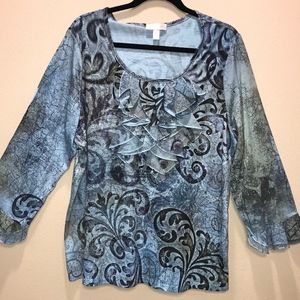 Patterned blouse with sparkles and a front ruffle